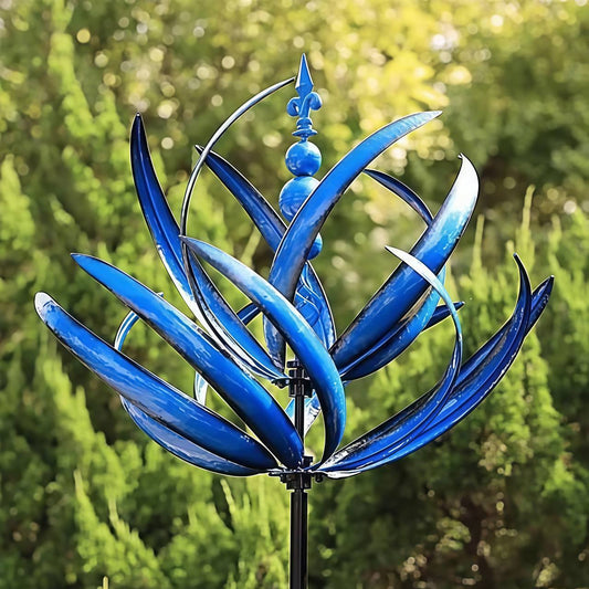 Blue metal wind spinner in a garden, featuring dual-direction spinning blades